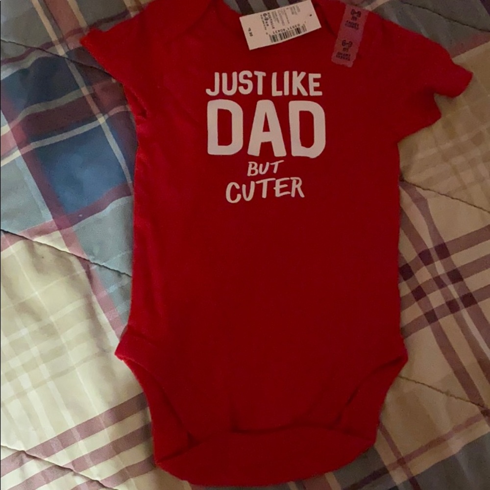 A baby boy short sleeve onesie